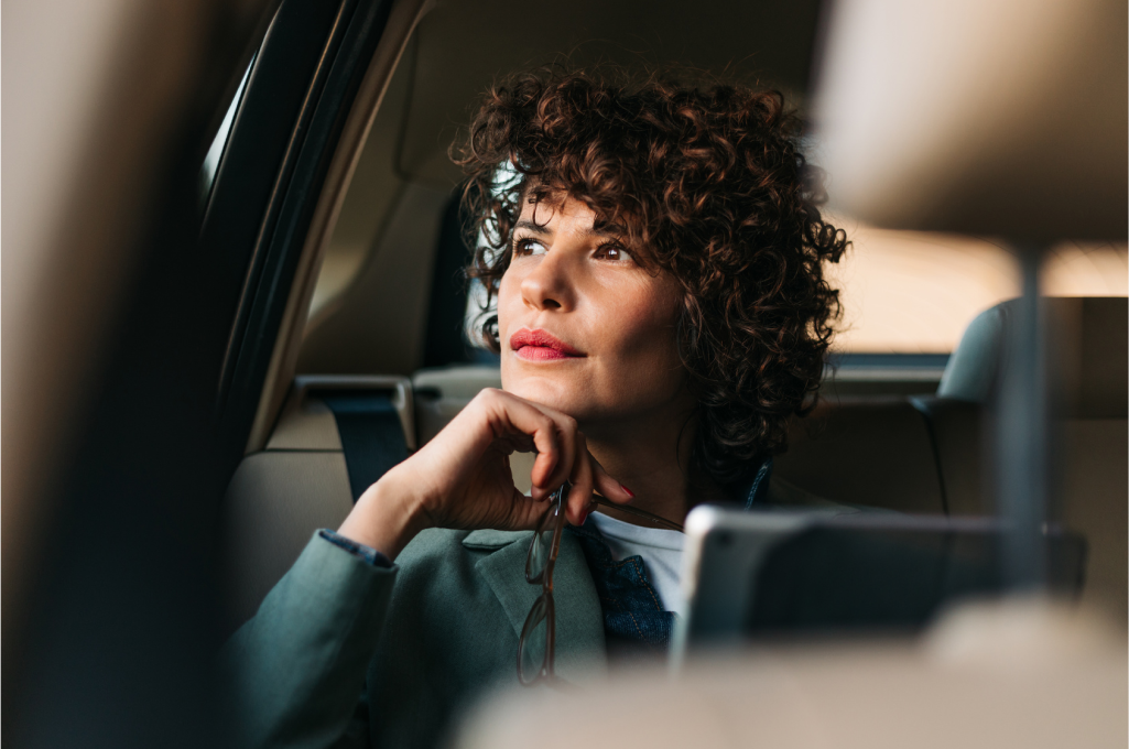 Business woman travelling in a car