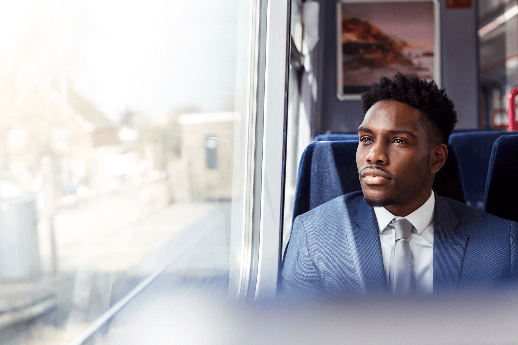 Man sitting on train